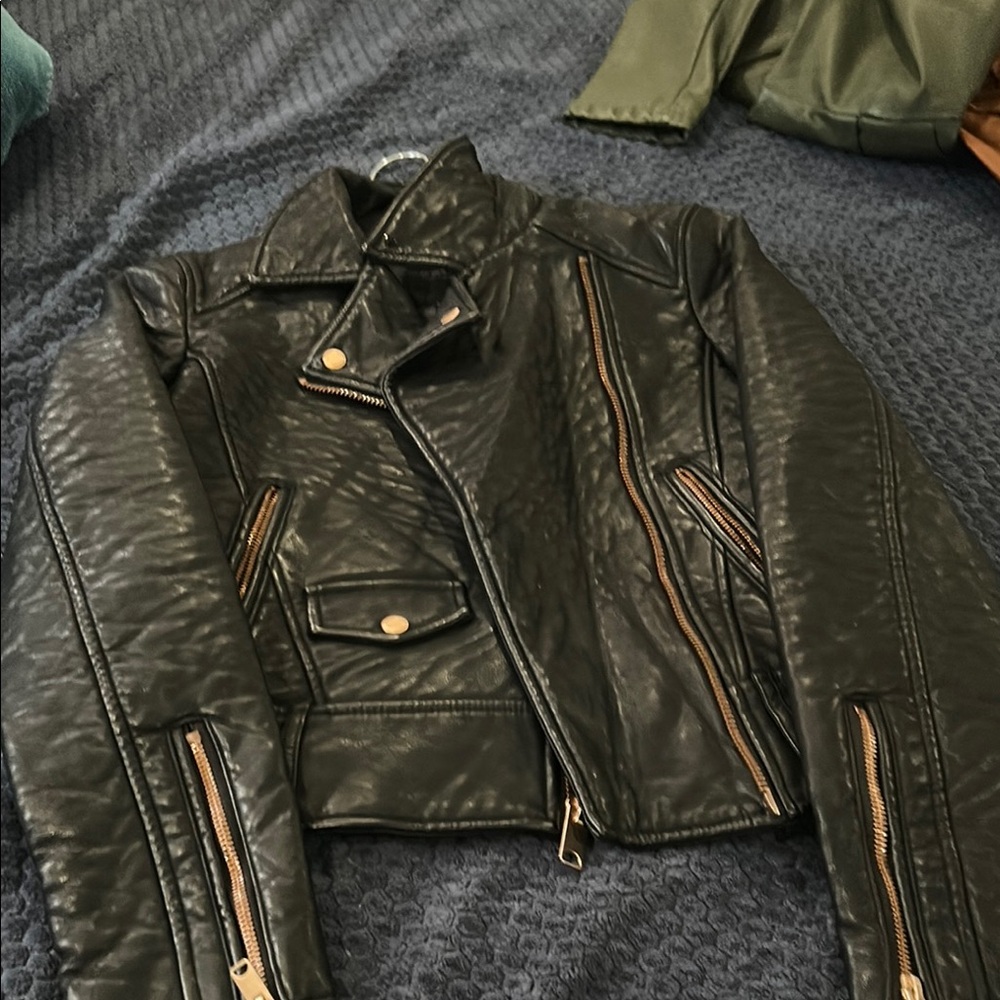 Black Leather Jacket with Gold Accents